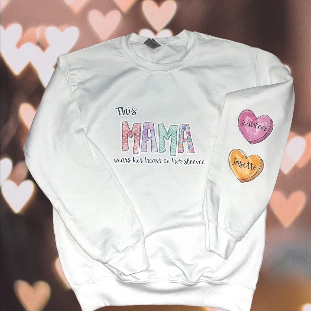 This mama wears her heart on her sleeve Sweatshirt